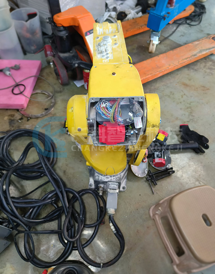 Repair the Fanuc robot LR Mate 200iD that has been submerged in water
